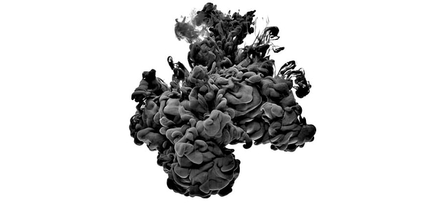 On a white background, black ink swirls through water, forming intricate patterns. This visual evokes the exploration of unique color palettes for website design.