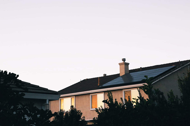 Home with solar panels on top