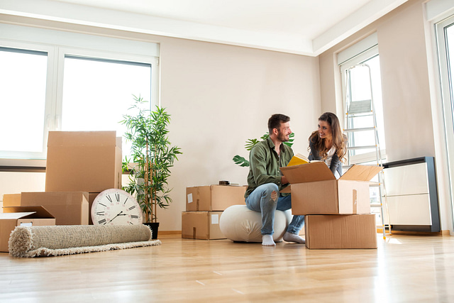 Targeting Homeowners on Facebook - A couple hanging out in their living room, after moving in